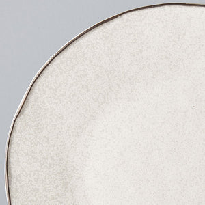 Uneven Off-White Plate with a Dark Rim 26.5cm · €35 · CURATED BY EYEDS