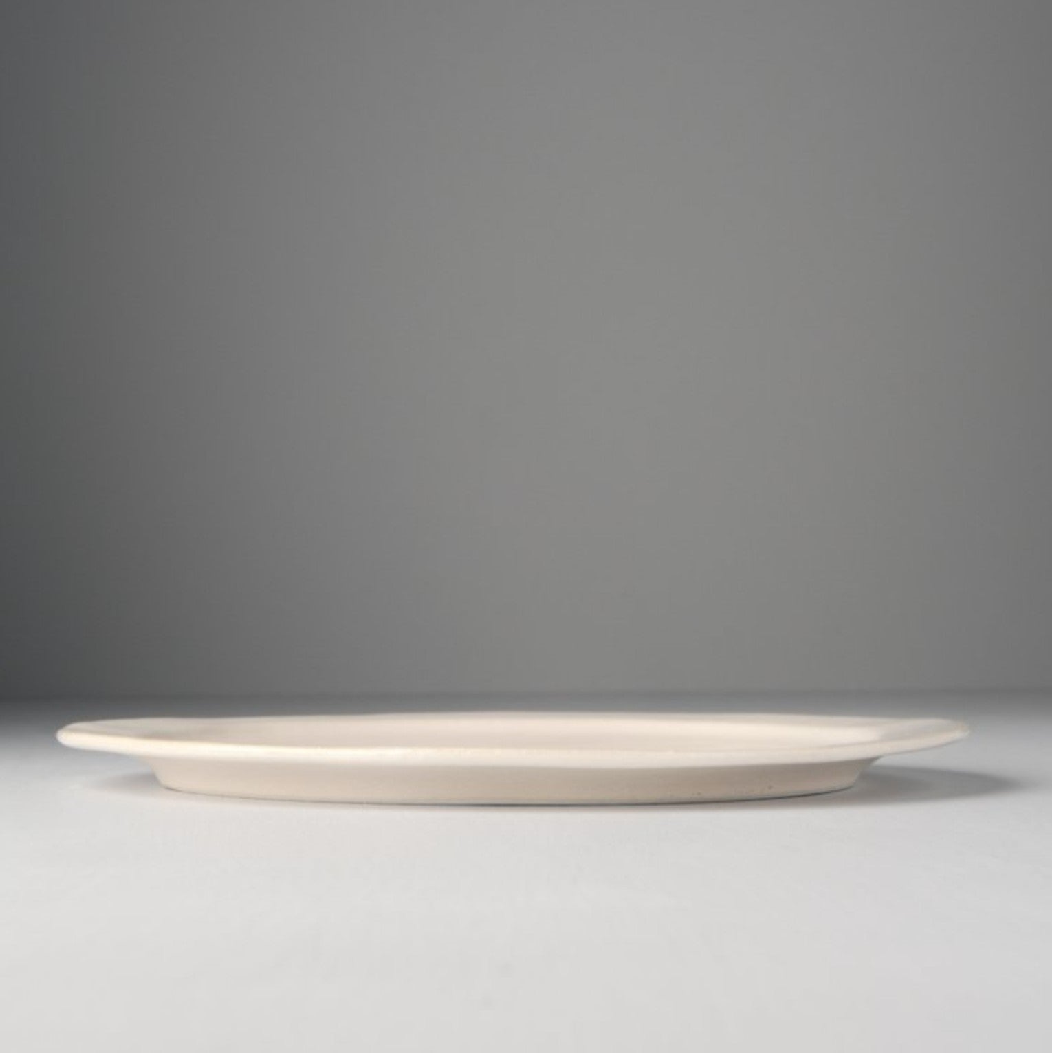 Round Plate Craft White 25.5cm · €35 · CURATED BY EYEDS