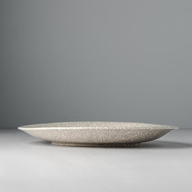 Uneven Large Round Plate 25cm · €30 · CURATED BY EYEDS