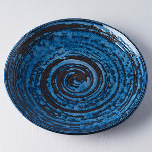 Uneven Round Plate Copper Swirl 25cm · €20 · CURATED BY EYEDS
